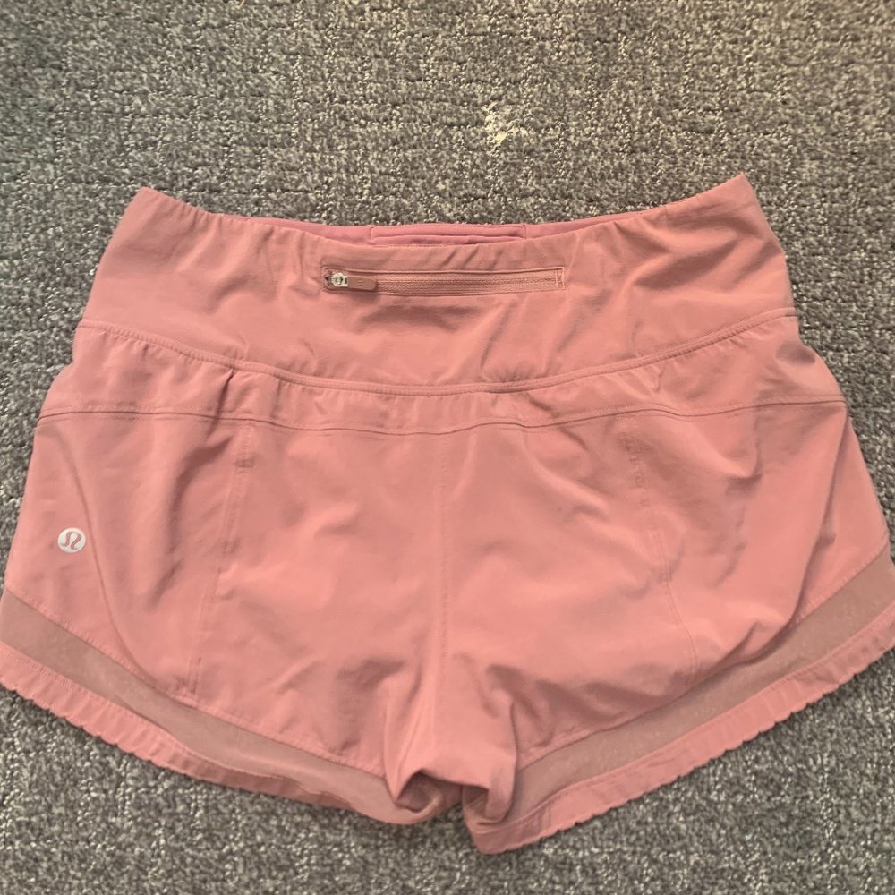pink/Salmon Lululemon shorts, size four